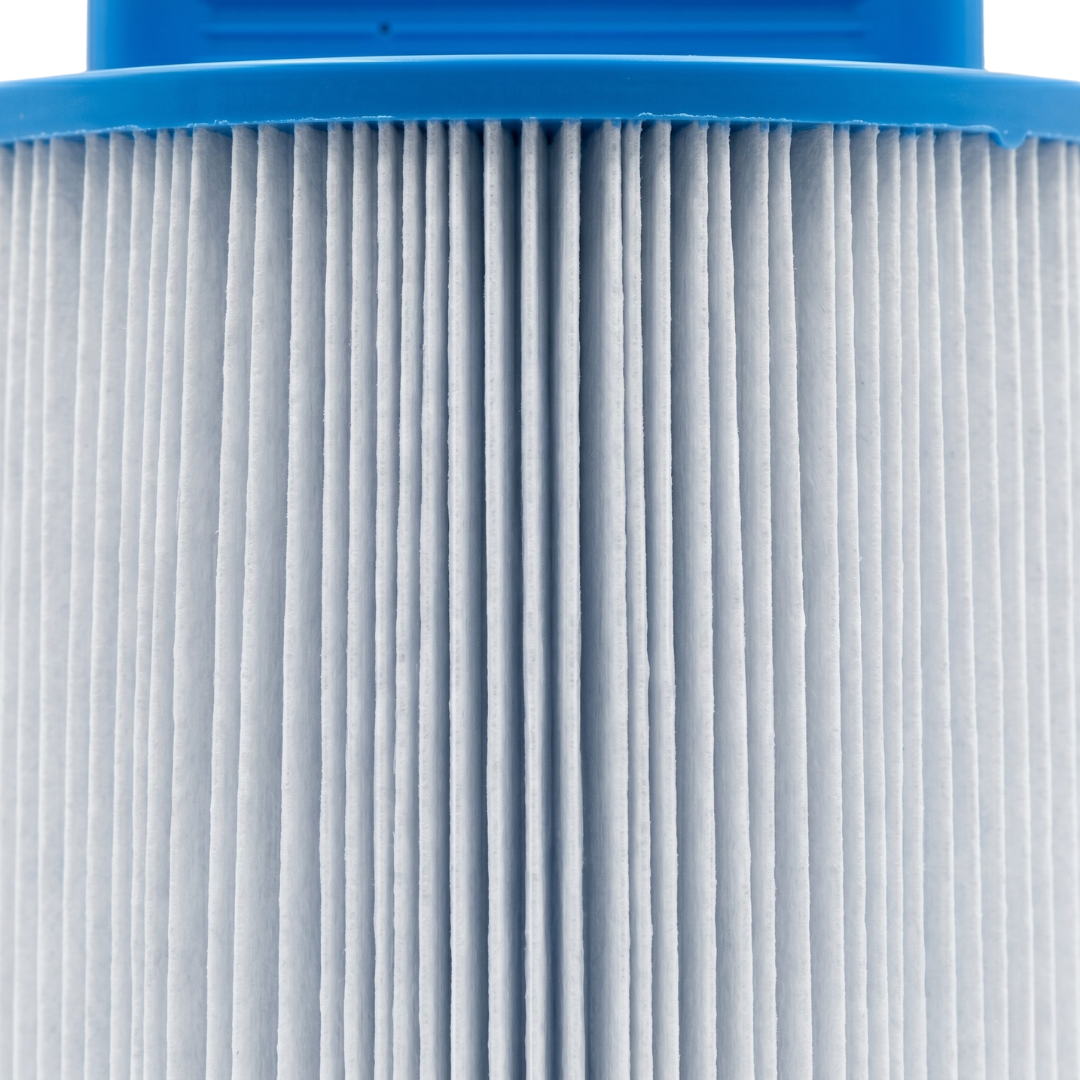 Macro texture close-up of the fine white pleated fabric media on a 75 Sq Ft replacement filter cartridge for Artesian Island Spas