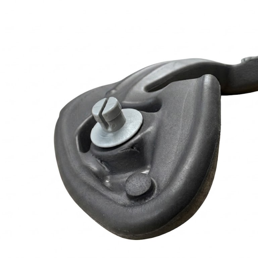 Close-up view of the grey plastic replacement mounting peg on the rear backing corner of an Artesian Spas Island series charcoal grey waterfall headrest pillow.