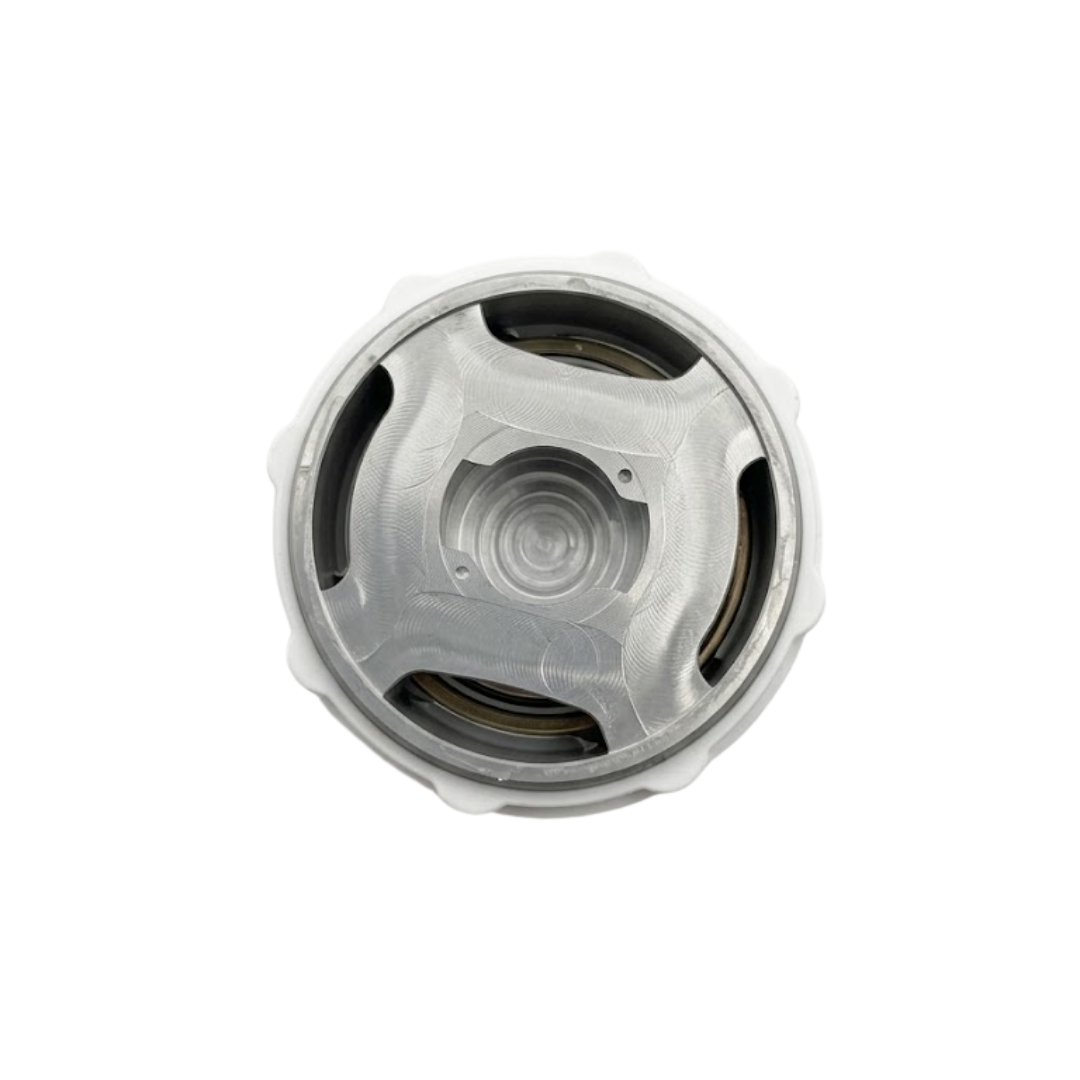 Direct rear view of the Artesian 2-inch Xylex/PVC light lens showing the internal metallic housing bracket, bulb socket mount, and white outer perimeter ring isolated on white.
