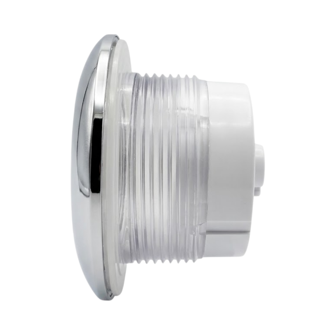 Horizontal side profile view of a fully assembled Artesian 5-inch light housing showing the stainless steel chrome front rim, clear gasket seal, threaded glass lens section, and white plastic rear socket casing.