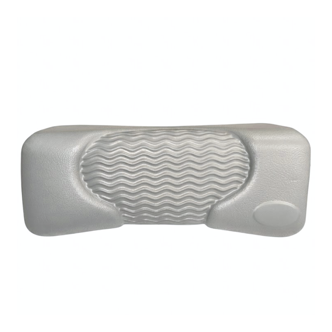 Front product shot of a light grey foam replacement lounger headrest pillow for an Artesian hot tub, featuring a textured faux-leather finish, a blank oval emblem insert, and a wavy-ridge center cushion pad against a white background.