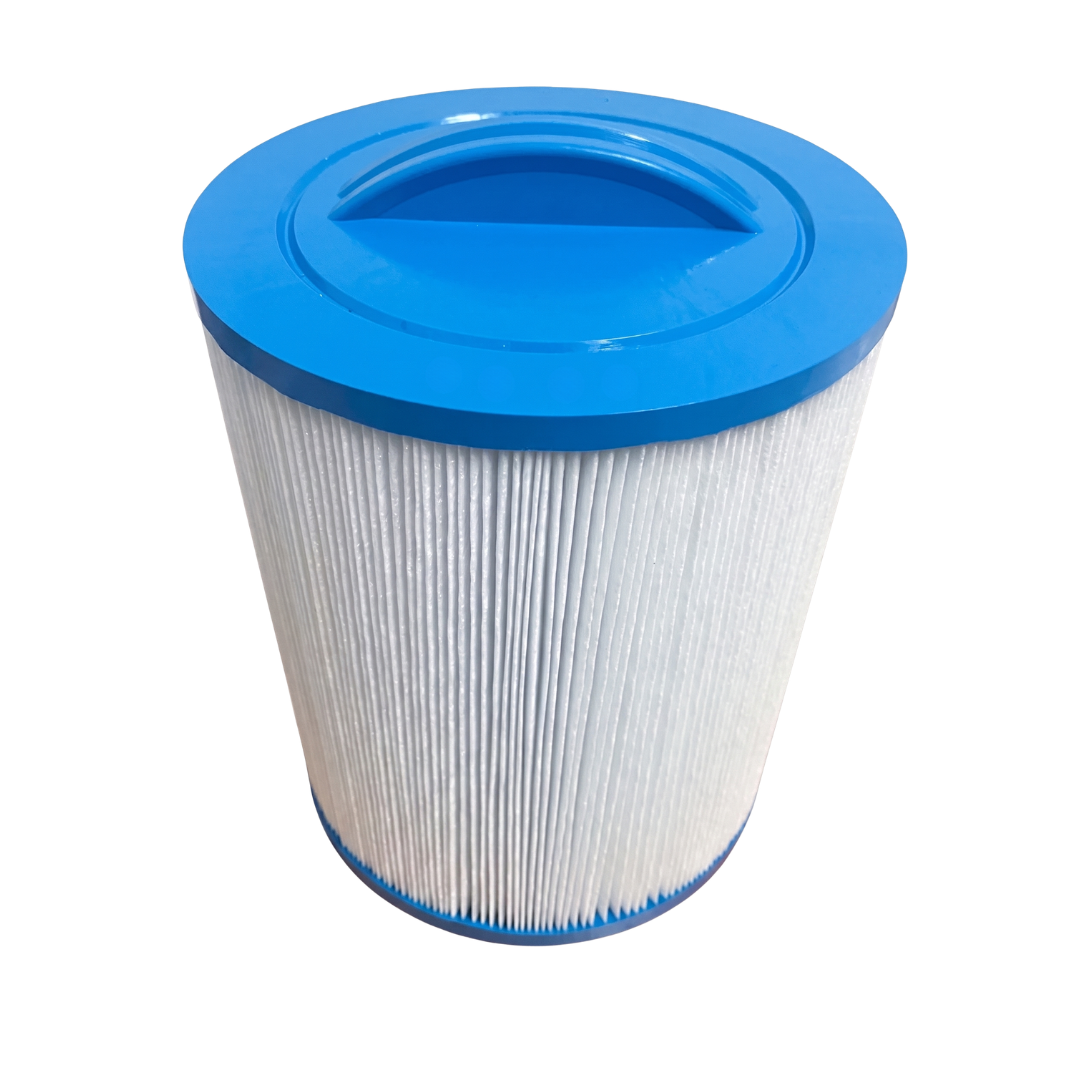 High-angle view of a cylindrical pleated Artesian Spa filter cartridge showing the white filter media and a bright blue top cap with an integrated handle.