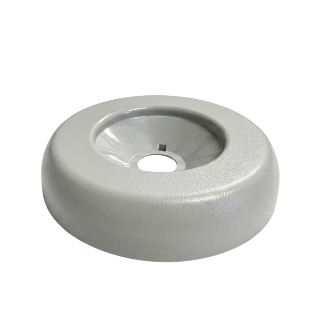A three quarter side perspective view of a grey 2 inch Artesian Spas diverter valve replacement cap showing its thick rounded profile rim and recessed center