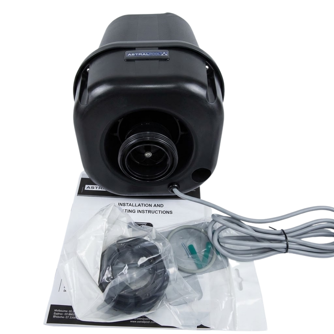 Bottom view of a black AstralPool SX1200 single speed spa air blower shown with connected grey power lead, bagged mounting fittings, and printed installation manual isolated on white.