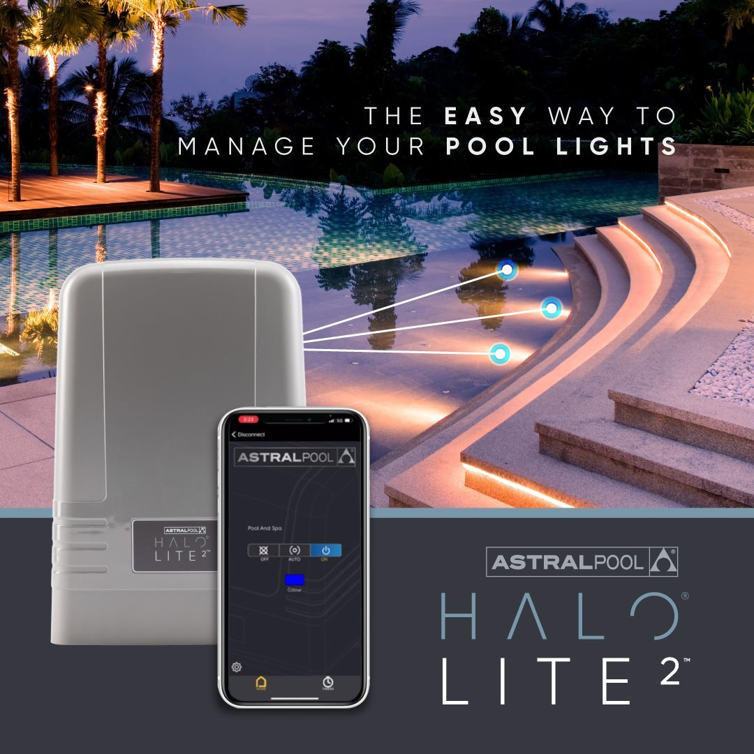 Promotional banner for the AstralPool Halo Lite 2 controller, showing a smartphone app interface alongside the controller unit, overlooking a luxury backyard swimming pool illuminated with under-water lights at dusk.