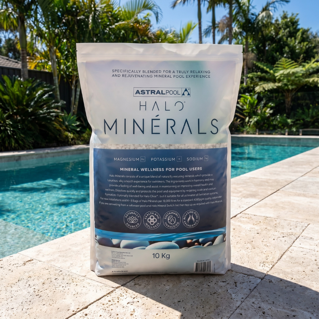 A 10kg bag of AstralPool Halo Minerals wellness pool blend sitting poolside, featuring a blend of magnesium, potassium, and sodium for a rejuvenating swimming experience.