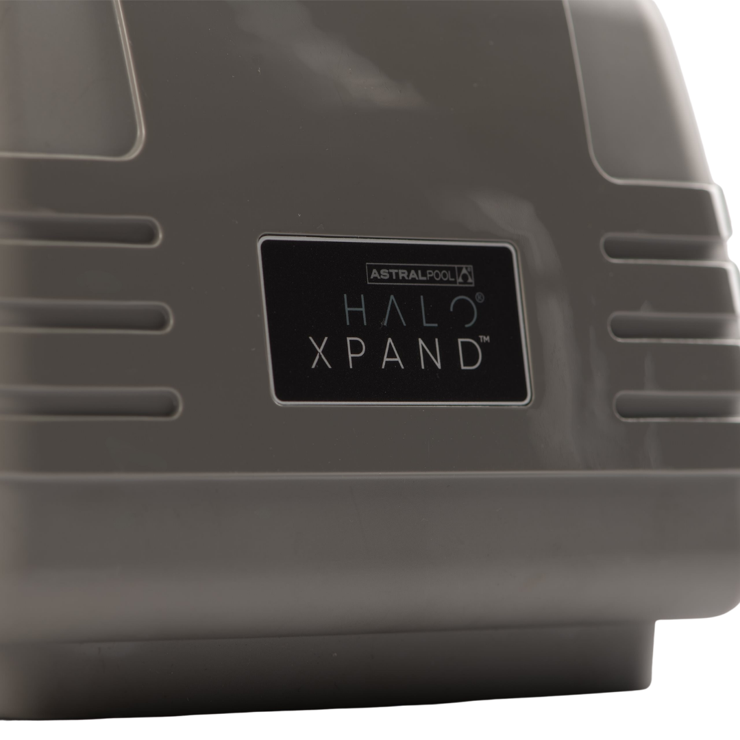 Close-up angled shot of the AstralPool Halo Xpand pool automation controller showing the product logo badge