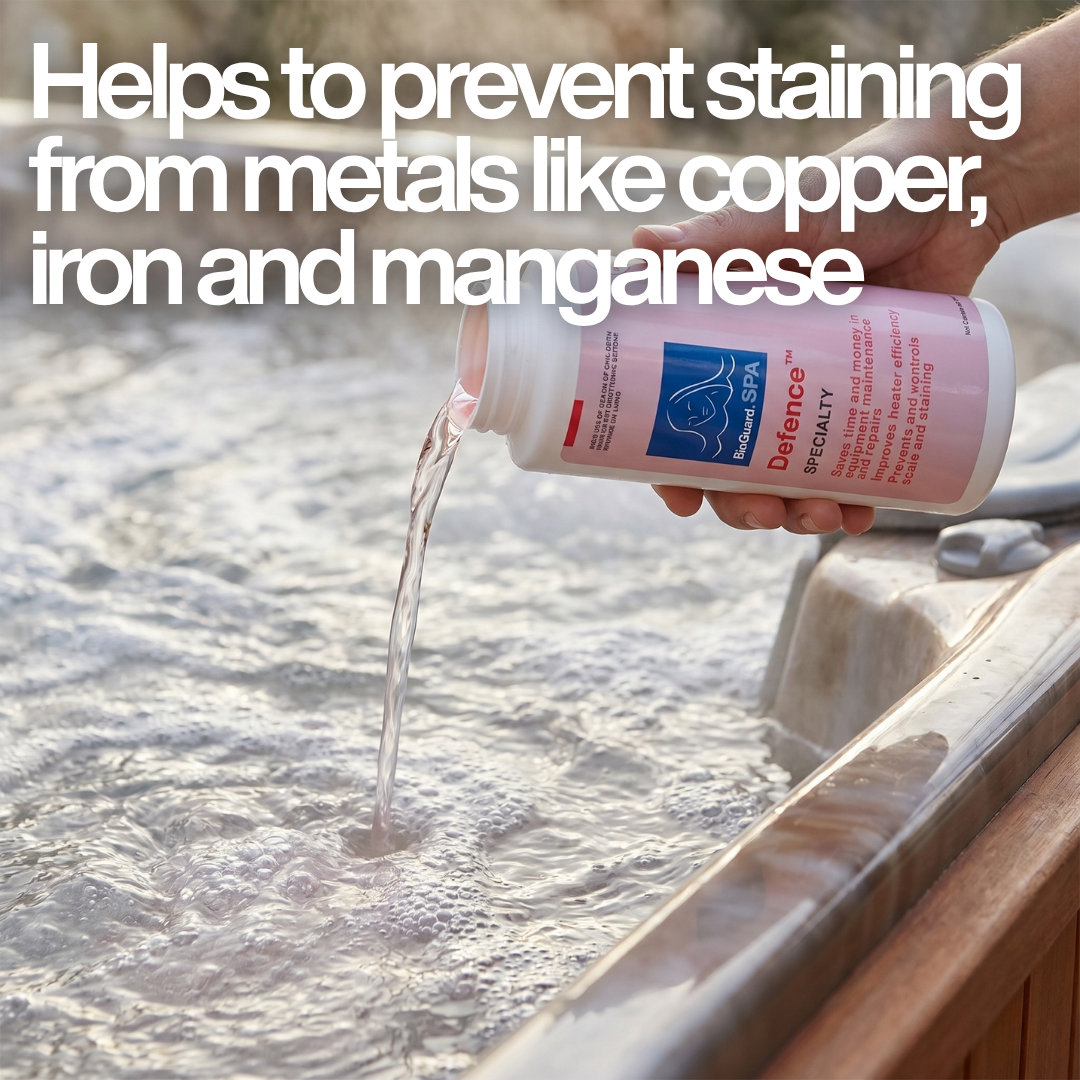 A person is pouring a light pink liquid chemical, identified as BioGuard SPA Defence, from a white bottle into the bubbling, steamy water of a hot tub.