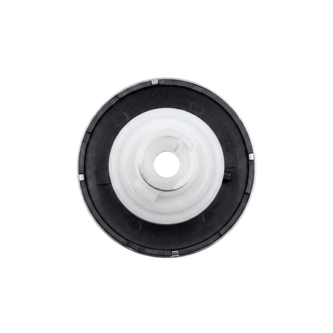 Direct overhead bottom-up view of the rear of a C-Helix 3 Directional SS spa jet internal insert, showing the dark face flange back with metallic retention tabs and central white plastic stem.