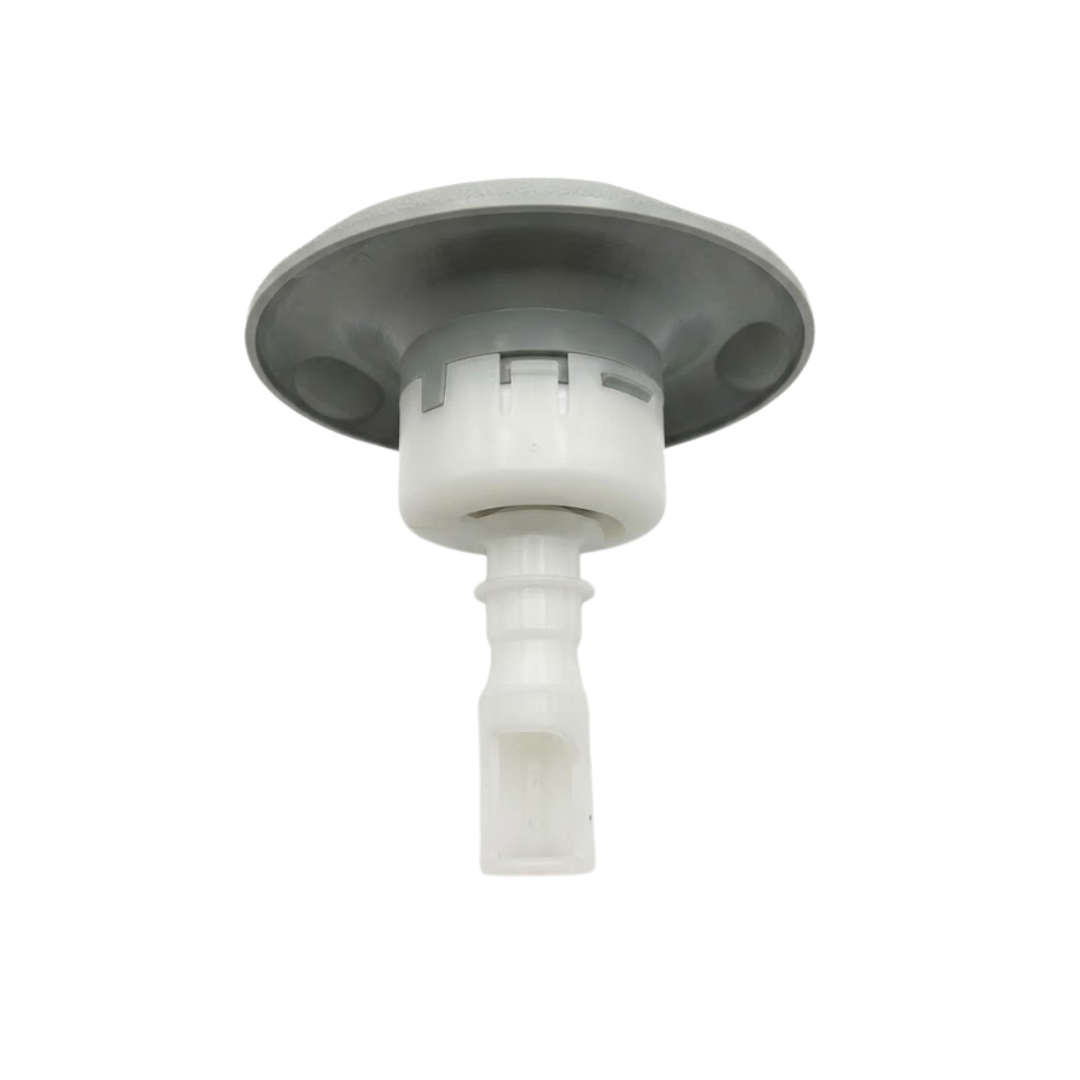 Three-quarter rear bottom view of a Cyclone Adj Swirl Emerald Large Face spa jet internal insert, showing the grey back of its rounded face flange, white cylindrical body, and narrow stem.