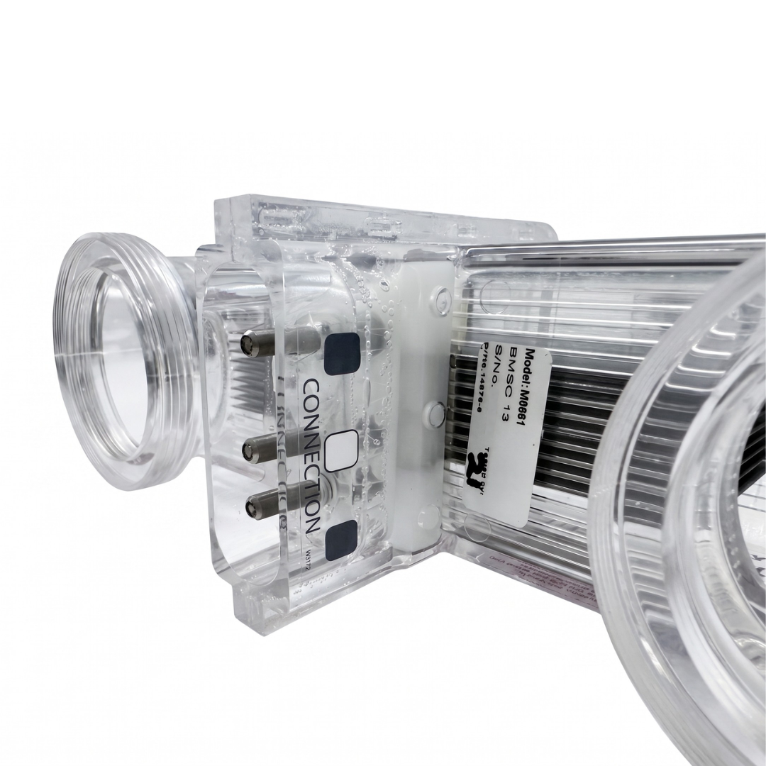 Side angle view of a clear replacement cell for a Davey EcoSalt BMSC 13 chlorinator, showing the three connection terminal pins, product model identification label, and threaded union ports.
