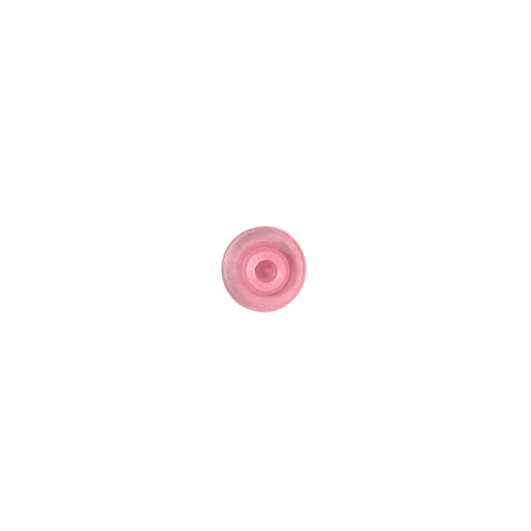 A direct top down view looking into the circular rear sleeve cavity of a pink plastic replacement air injector cone for Edgetec spa jets
