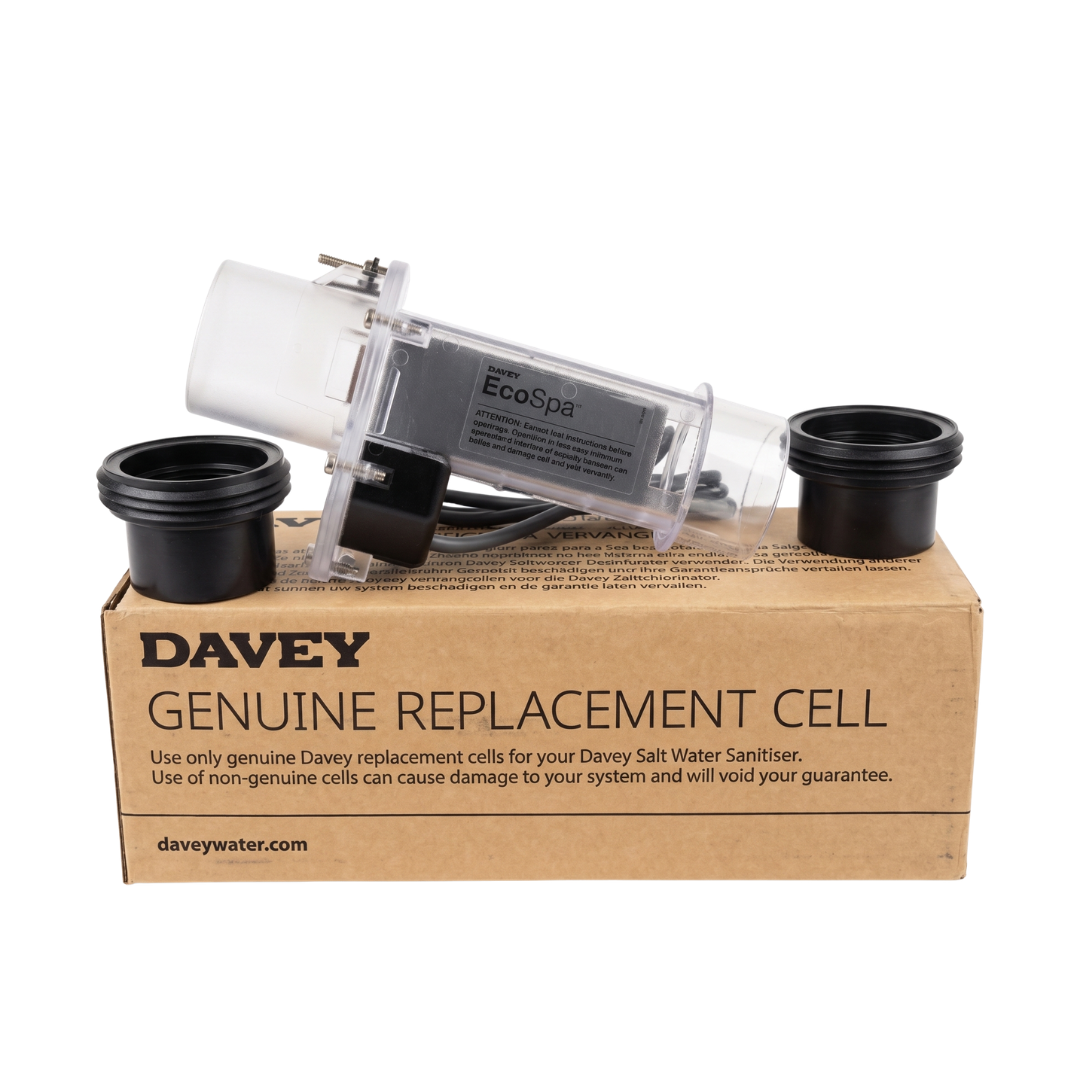 Genuine Davey EcoSpa replacement electrolytic salt cell kit sitting on its cardboard packaging box, complete with the clear acrylic cell and two black union tail piece adapters.