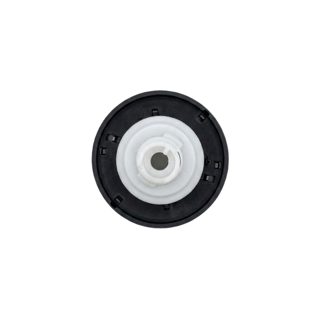 Direct overhead bottom-up view of the rear of a Halo 3 Directional plastic spa jet internal insert, showing the dark circular face flange back and central white plastic stem.