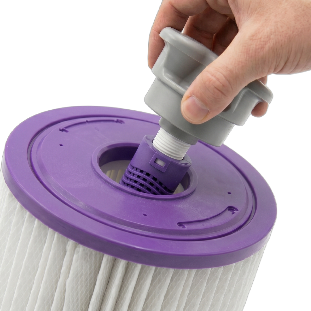 Close-up demonstration showing a hand screwing a grey disposable filter cap onto a purple mineral stick sanitizer inside the core of a pleated spa cartridge filter