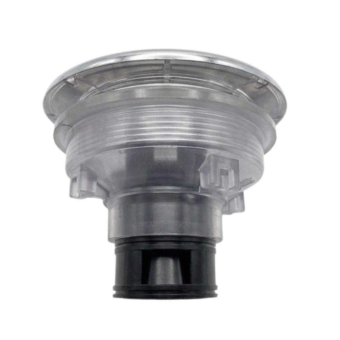 Side profile view of an Ovo Swim With Metal 2in SX 12in Artesian spa jet insert, showing the metallic face flange lip, clear plastic body casing with retention tabs, and black lower stem assembly.