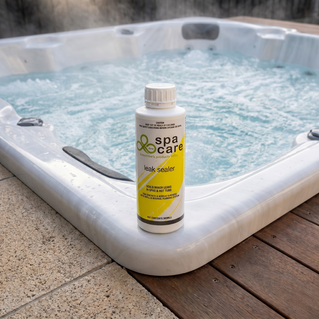 A 500ml bottle of Spa Care Leak Sealer by Lo-Chlor on the edge of a hot tub with bubbling water, illustrating a product to seal leaks in spas and hot tubs.