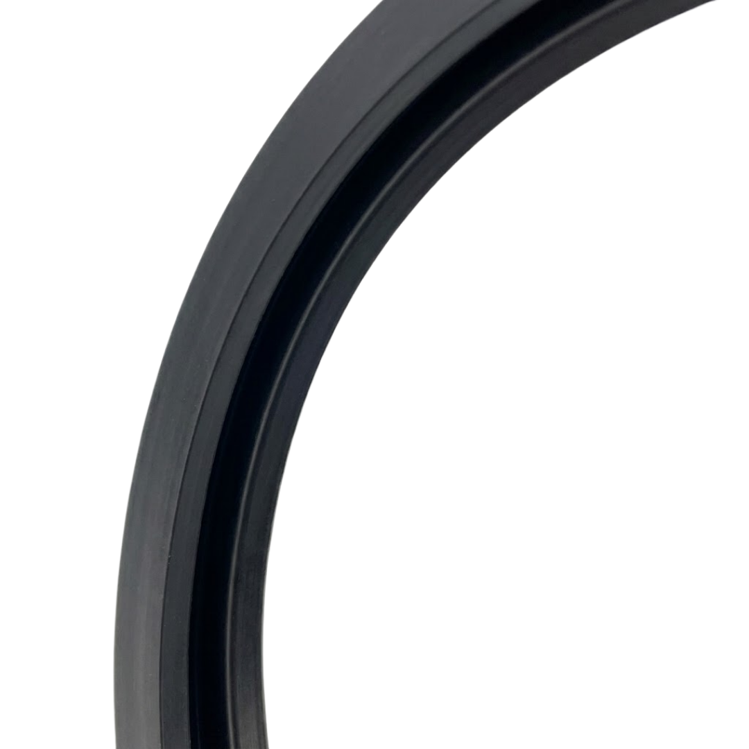 Close-up detail view of a black rubber Spa Electrics WN203 gasket section, highlighting the internal channel groove and sealing lip profile.