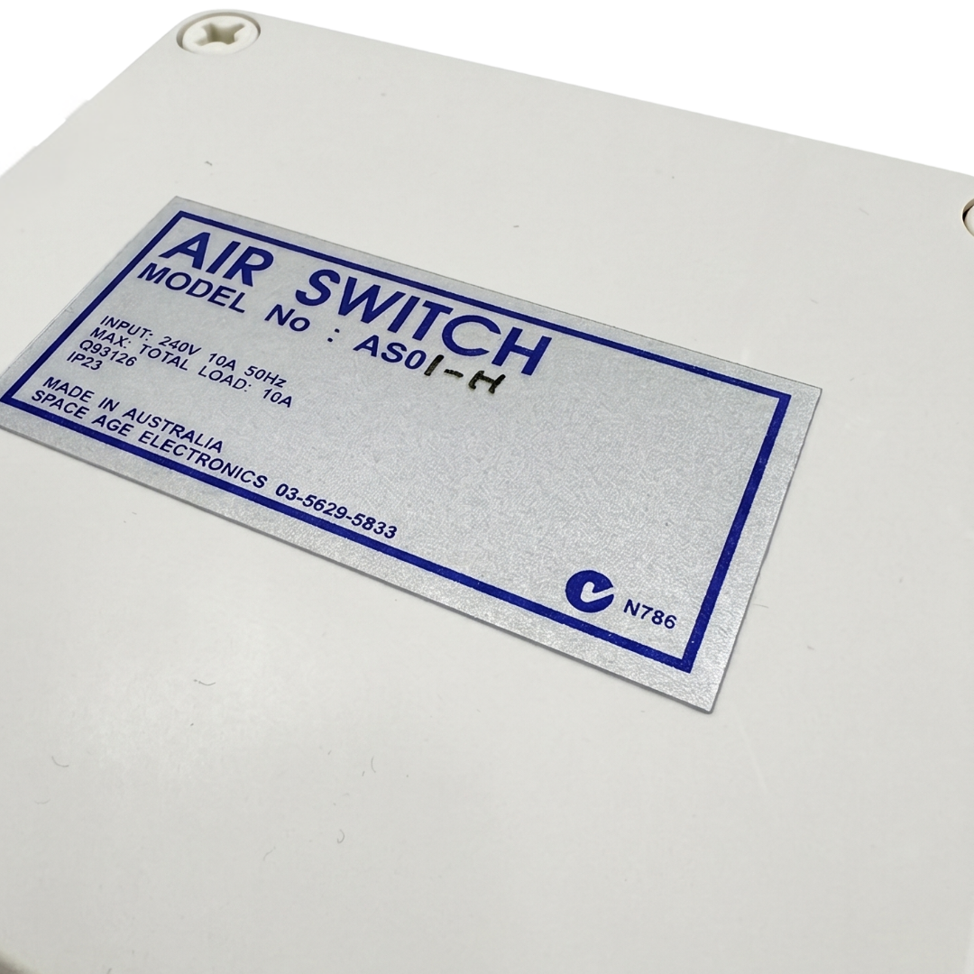 Close-up angled view of Space Age Electronics AS01-H single outlet air switch product label showing technical specifications and N786 compliance marks.