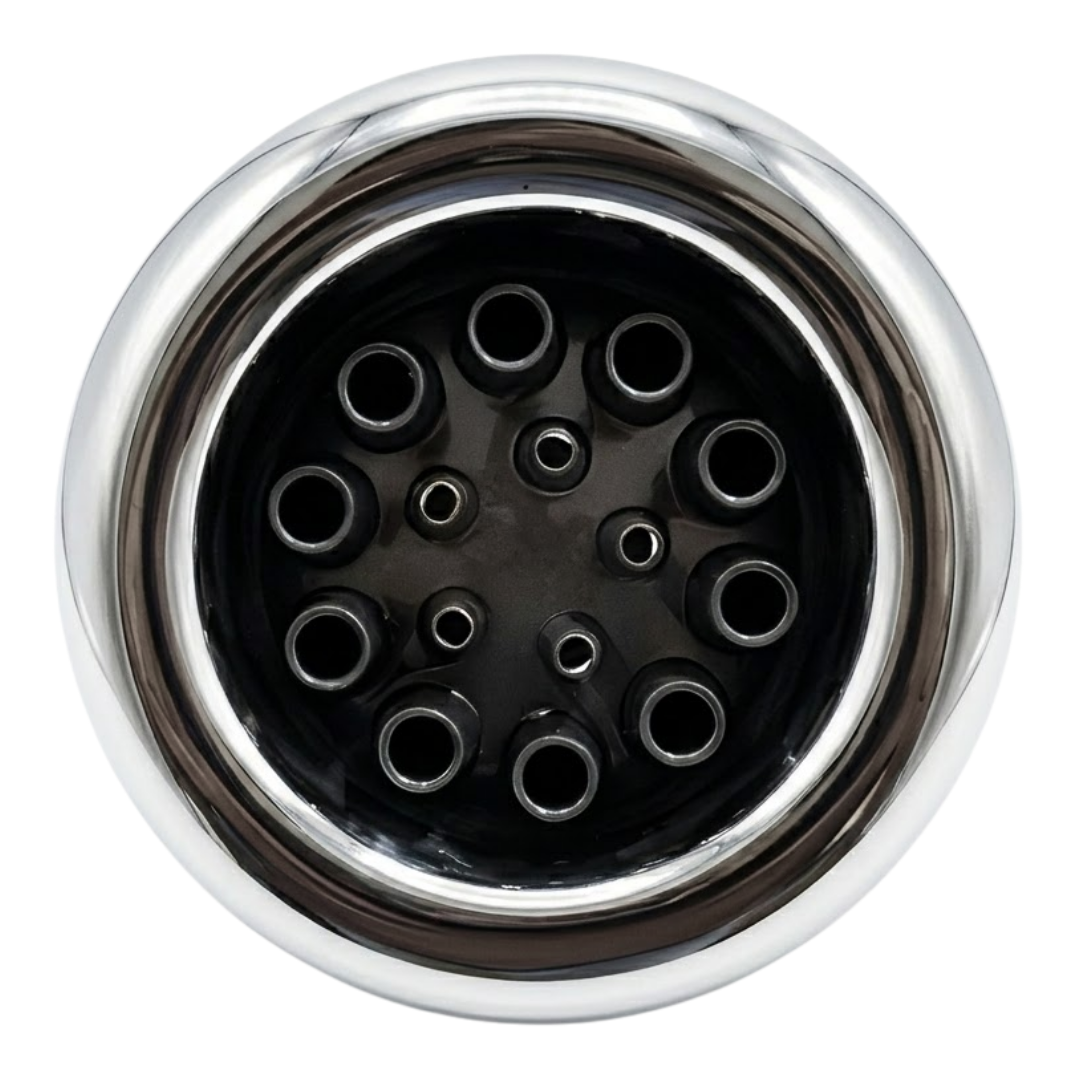 Direct overhead front view of an Ultra Blaster 7 SS Graphite spa jet internal insert, featuring a polished stainless steel outer bezel ring and a dark graphite face plate with multiple jet nozzle orifices.