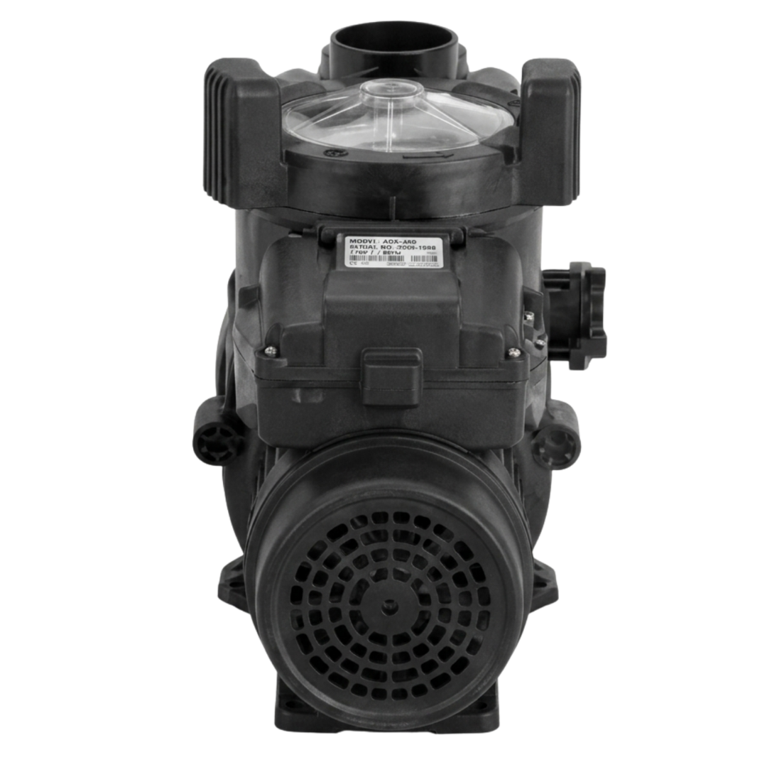 Direct rear studio view of a Zodiac FloPro SS 1.0 HP pool pump, showing the circular vented motor fan cowl, top terminal box with serial label plate, clear lid handles, and discharge port isolated on white.