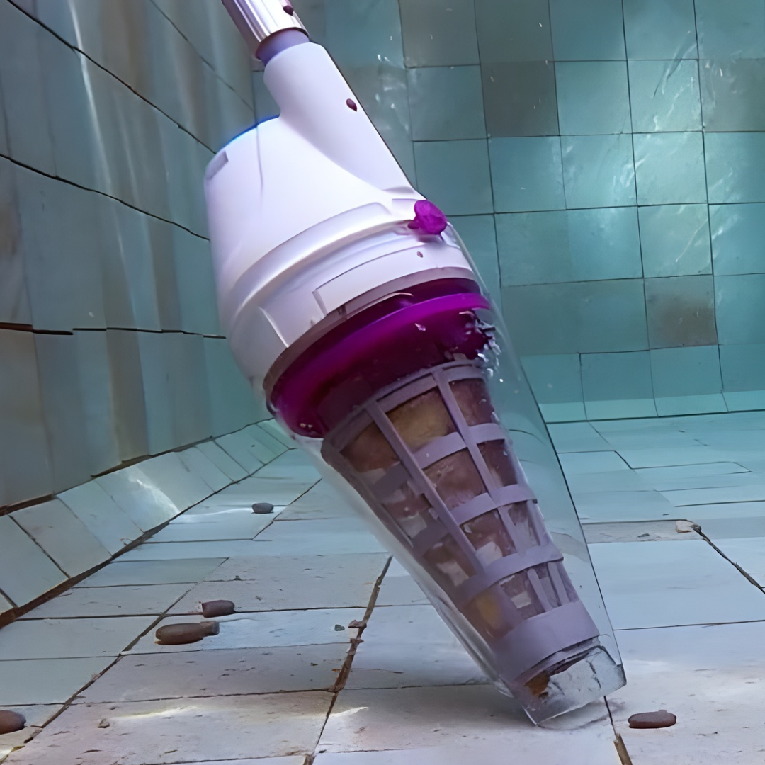 Submerged Kokido Telsa 50 rechargeable pool vacuum cleaner highlighting the transparent debris canister and internal mesh filter cone collecting dirt on a tiled swimming pool floor.