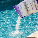 Close-up of BioGuard Stabiliser being poured into a swimming pool to increase cyanuric acid levels and protect chlorine from UV burn-off.