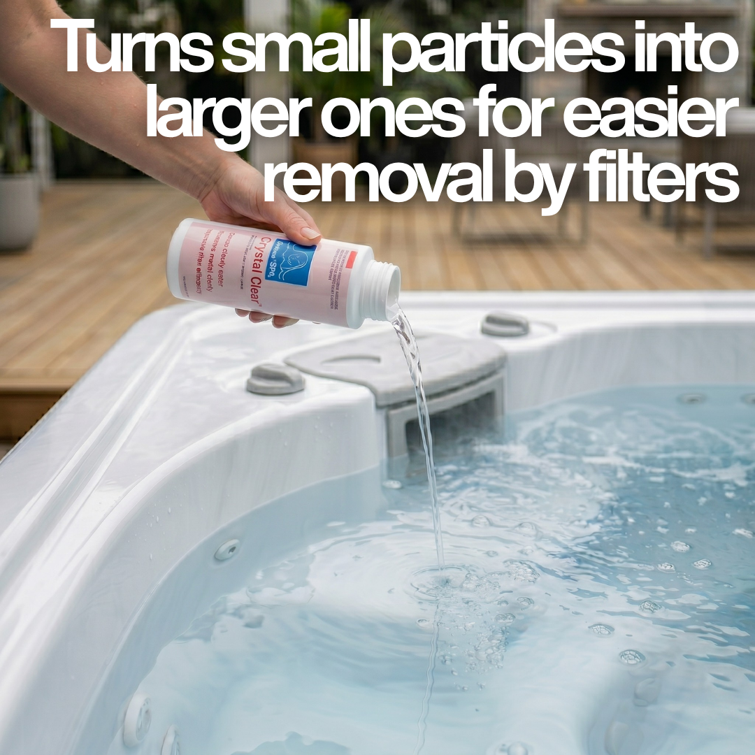 A person pouring clear liquid from a bottle of BioGuard SPA Crystal Clear water clarifier directly into a bubbling hot tub. Large white text overlay reads "Turns small particles into larger ones for easier removal by filters," illustrating how the spa clarifier aids filtration.