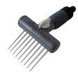 An isolated studio shot of a gray and white Aqua Comb cartridge filter cleaning tool on a white background, featuring white comb tines, a control valve switch, a ribbed hose adapter handle, and embossed text reading Aqua Comb, Made in USA, and US Pat 8597435.