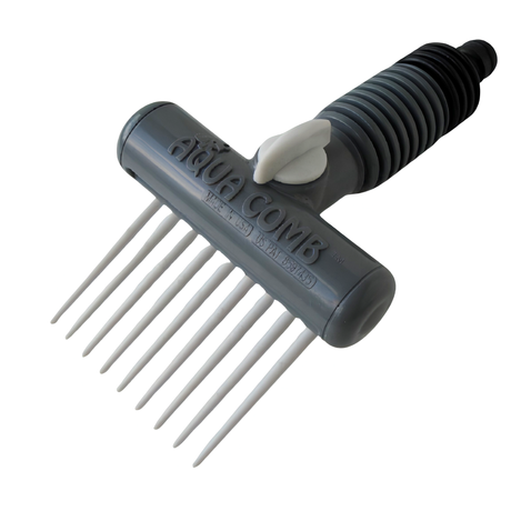 An isolated studio shot of a gray and white Aqua Comb cartridge filter cleaning tool on a white background, featuring white comb tines, a control valve switch, a ribbed hose adapter handle, and embossed text reading Aqua Comb, Made in USA, and US Pat 8597435.