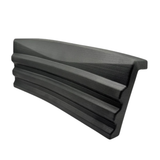 Side angle perspective view of a charcoal grey textured replacement headrest pillow for an Artesian Elite lounge spa seat, highlighting its angled profile design on a white background.