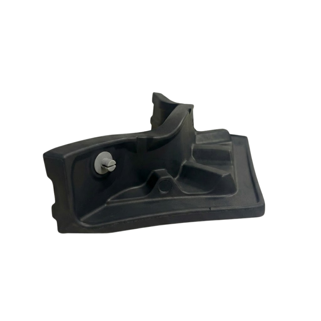 Side perspective view of the reverse side of a charcoal black replacement neck headrest pillow for an Artesian Elite spa, highlighting the molded structural backing and grey snap-in plastic fastener pin against a white background.