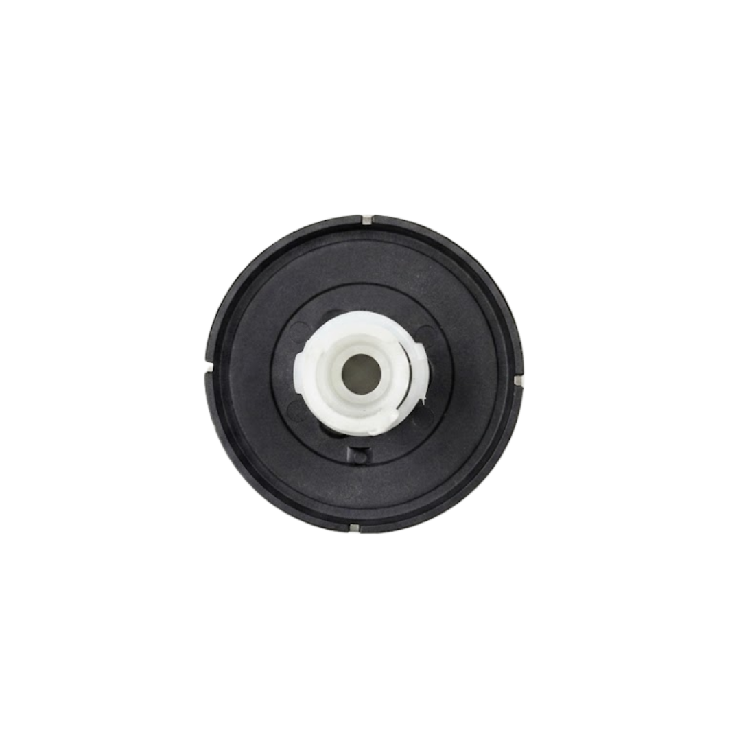 Direct overhead bottom-up view of the rear assembly on an Artesian C-Helix 2.75 SS spa jet insert, showing the dark grey back flange ring and central white plastic stem.