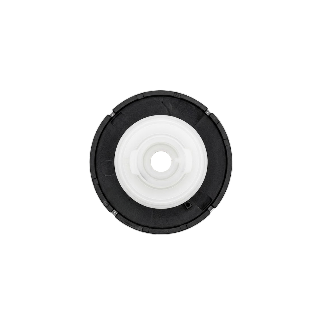 Direct overhead bottom-up view of the rear assembly on an Artesian C-Helix 3 ROTO SS spa jet insert, showing the dark grey outer face plate ring and central white plastic stem.
