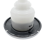 Close-up angled view of the rear face flange housing on an Artesian C-Helix 3 ROTO SS spa jet insert, showing the dark grey back flange ring, small indexing tab, and white translucent body casing.