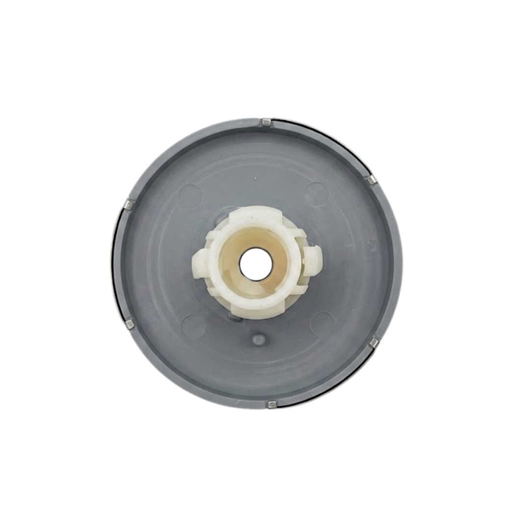 Direct overhead bottom-up view of the rear assembly on an Artesian Cluster SS PE 2.75 spa jet insert, showing the grey circular rear face plate and central white plastic stem.