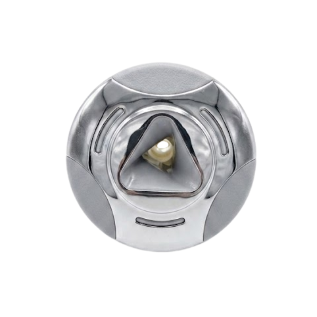 Direct overhead front view of an Artesian Cluster SS PE 2.75 spa jet insert, featuring a stainless steel bezel with textured grey accents and a central triangular inner opening with a single nozzle port.