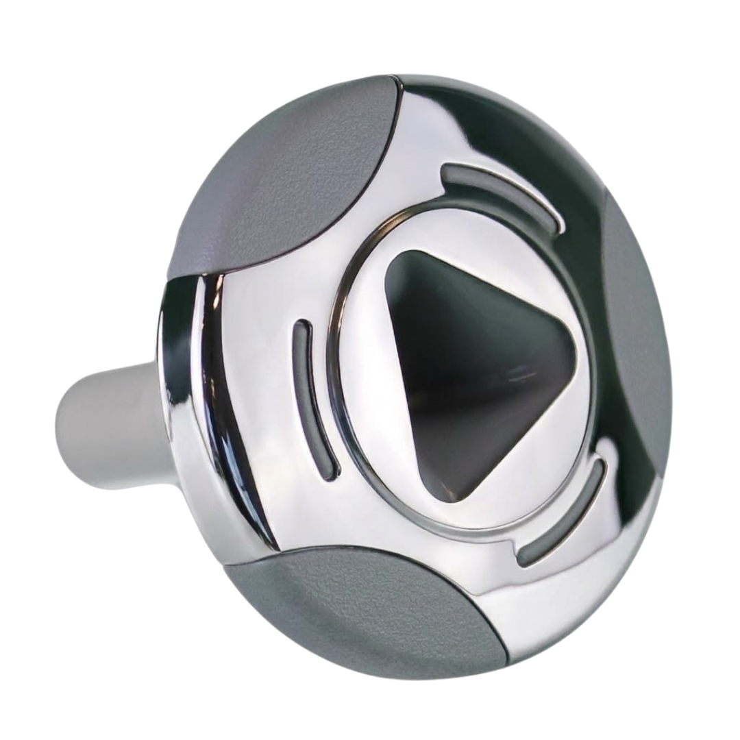 Three-quarter angled view of an Artesian Cluster SS PE 2.75 spa jet insert, showing the polished stainless steel face plate, textured grey accents, central triangular opening, and rear white stem.