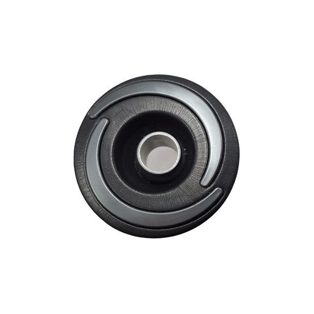 Direct overhead front view of an Artesian Halo 2 Directional plastic spa jet insert, featuring a textured black bezel with grey swirl accents and a central directional eyeball nozzle.