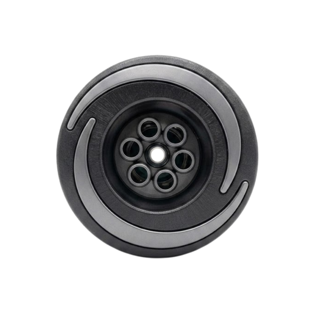 Direct overhead front view of an Artesian Halo 3 Massage plastic spa jet insert, featuring a textured black bezel with grey swirl accents and a central six-port massage nozzle cluster with a middle opening.