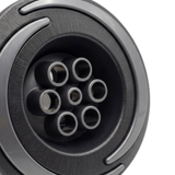 Close-up angled view of the central six-port massage nozzle cluster on an Artesian Halo 3 Massage plastic spa jet insert, showing the textured black bezel with grey swirl accent detailing.