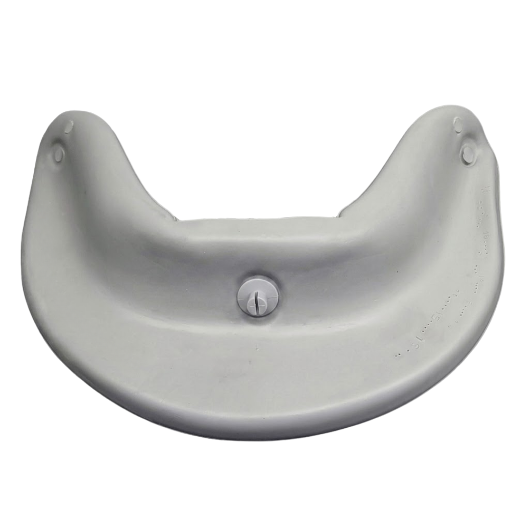 Direct reverse side view of a grey curved foam replacement neck headrest pillow for an Artesian hot tub, showing the smooth backing with a centered snap-in plastic attachment pin.