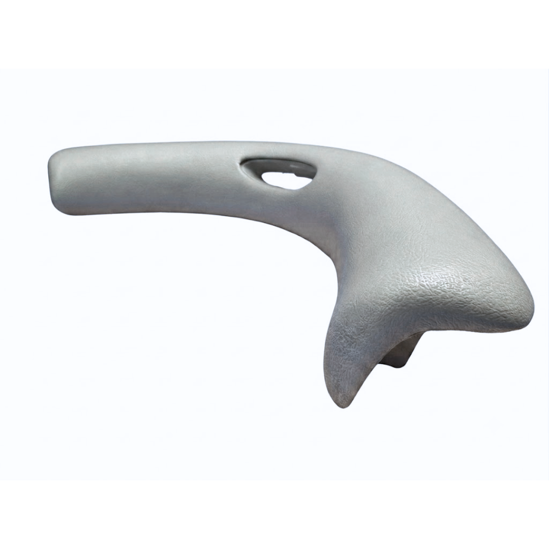 Side perspective view of a grey large wrap-around foam replacement headrest pillow for an Artesian hot tub, showcasing its ergonomic curved end profile and central oval cutout.