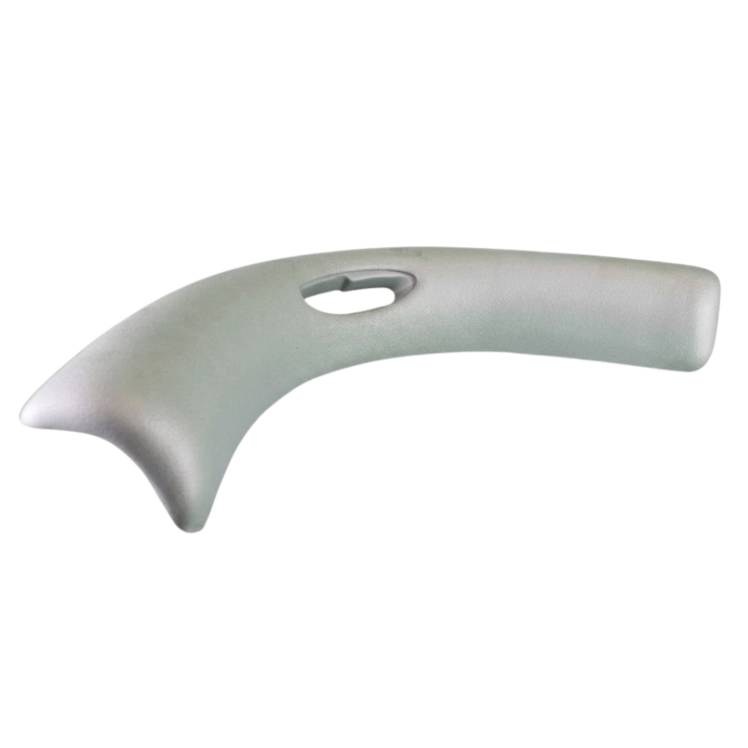 Side angle perspective view of a grey large wrap-around foam replacement headrest pillow for an Artesian hot tub, highlighting its contoured curvature and center oval cutout hole.