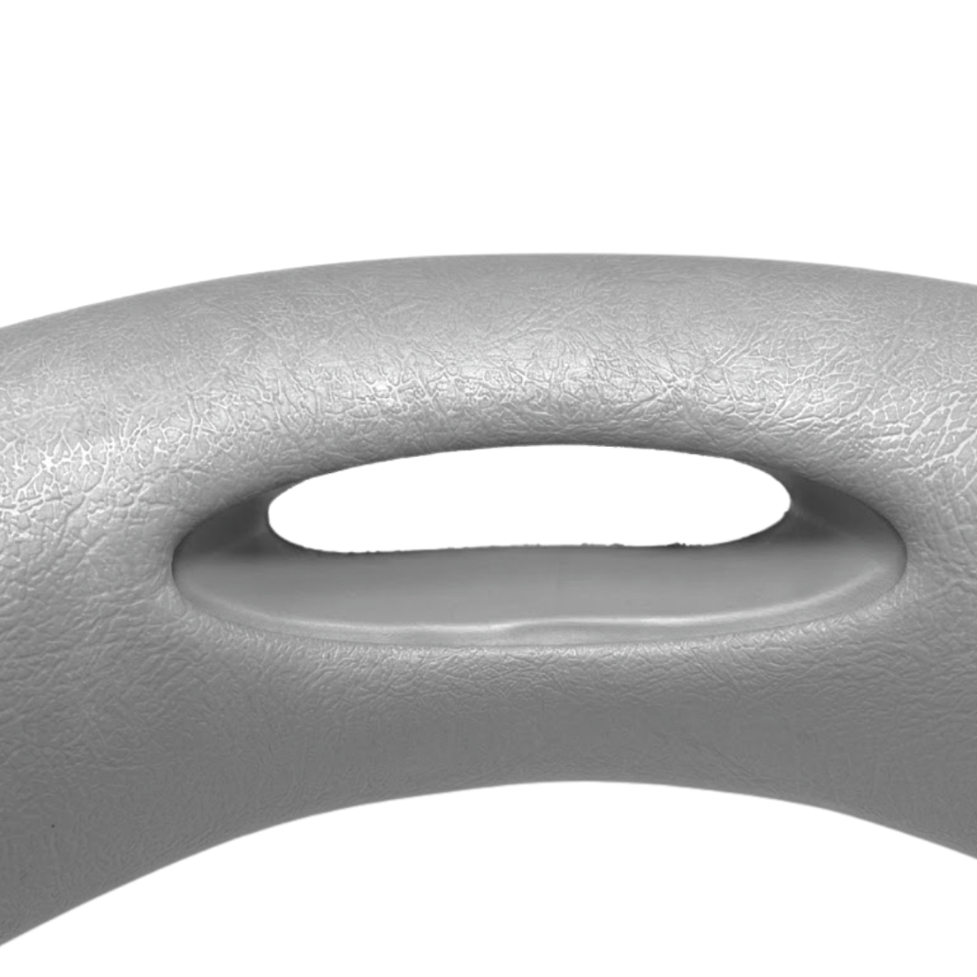 Close-up texture view of a grey large wrap-around foam replacement headrest pillow for an Artesian hot tub, focusing on the oval center slot cutout and textured faux-leather finish.