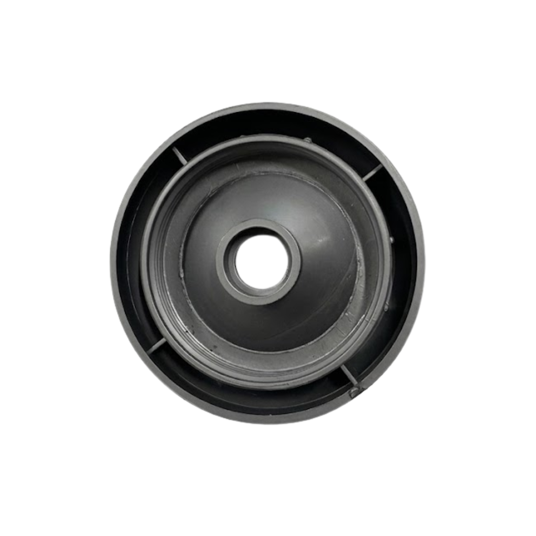 A top down overhead view of the underside of a dark graphite grey 2 inch Artesian Spas diverter valve replacement cap showing the internal female threads, molded support ribs, and central stem sleeve