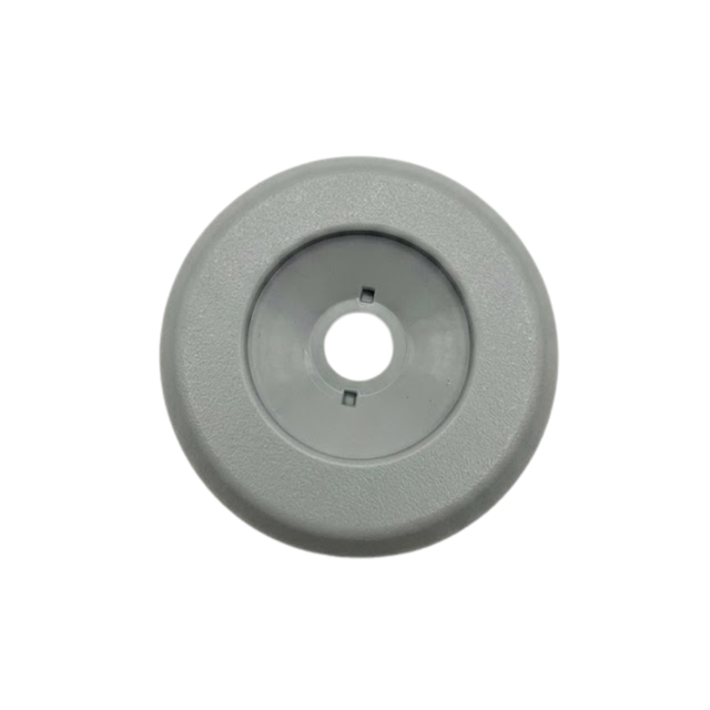 A top down overhead face view of a grey 2 inch Artesian Spas diverter valve replacement cap showing the textured round trim bezel and recessed center with stem hole