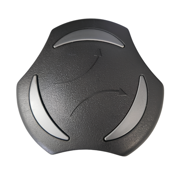A top down overhead face view of a black 2 inch Artesian Spas diverter valve replacement handle knob showing a textured triangular shape with three silver crescent accents and debossed directional split arrows