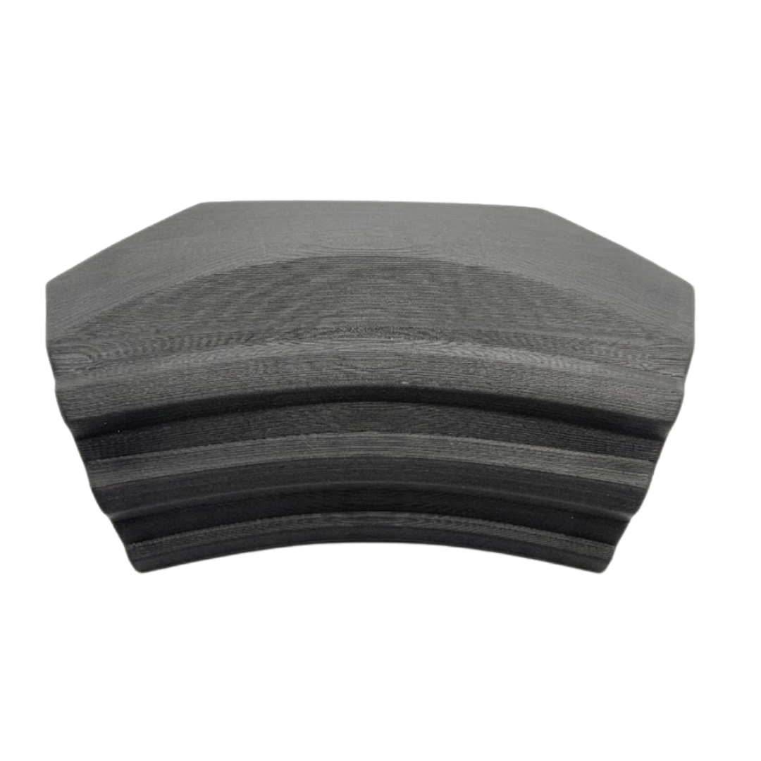 Front product view of a charcoal black curved replacement Elite corner headrest pillow for an Artesian Spas hot tub, featuring a stacked, tiered ridge design with a textured finish against a white background.