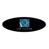 Rear view of an oval replacement resin dome label insert for an Artesian Spas headrest pillow, showing the black adhesive backing with the mirrored teal logo silhouette and reversed "ARTESIAN SPAS" text.